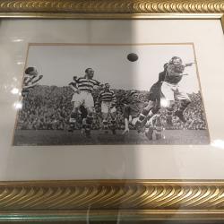 Framed match action photograph, Shamrock Rovers before a large crowd