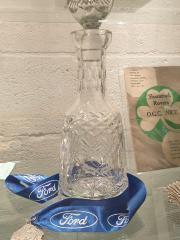 RDS glass bottle and medal, 1990