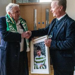 Paddy Mulligan is presented with a framed photograph, 1 May 2026